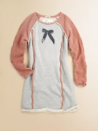She'll be comfortable and fashionable in this pretty sweatshirt dress with a turn-back hem, reversed fabric sleeves and contrast trim. ScoopneckLong sleeves with reversed fabricPullover styleContrast solid trimFront graphicTurn-back hem80% cotton/20% polyesterMachine washImported She'll be comfortable and fashionable in this pretty sweatshirt dress with a turn-back hem, reversed fabric sleeves and contrast trim. ScoopneckLong sleeves with reversed fabricPullover styleContrast solid trimFront graphicTurn-back hem80% cotton/20% polyesterMachine washImported