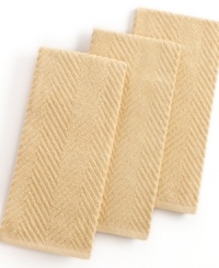 Grab style and keep function with a set of three kitchen towels that step forward in a calm color to wipe up spills, aid in prep and add an accent to your space. The textured design sets a sharp appearance for any room, while the highly absorbent terry quickly cleans up. Limited lifetime warranty. Grab style and keep function with a set of three kitchen towels that step forward in a calm color to wipe up spills, aid in prep and add an accent to your space. The textured design sets a sharp appearance for any room, while the highly absorbent terry quickly cleans up. Limited lifetime warranty.