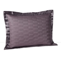 An abstract stitched motif adds texture to quilted cotton sateen and silk. A silk border adds a luxurious sheen. An abstract stitched motif adds texture to quilted cotton sateen and silk. A silk border adds a luxurious sheen.