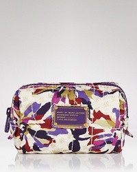 The ultimate beauty bag for the discerning fashionista. MARC BY MARC JACOBS' nylon cosmetics case flaunts the designer's bold print and product perfect proportions. The ultimate beauty bag for the discerning fashionista. MARC BY MARC JACOBS' nylon cosmetics case flaunts the designer's bold print and product perfect proportions.