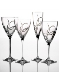 Only Vera Wang could capture elegance so gracefully and tie it up with a bow. With a sleek silhouette and narrow stem, this etched crystal goblet lends refined whimsy to every occasion. Shown left. Only Vera Wang could capture elegance so gracefully and tie it up with a bow. With a sleek silhouette and narrow stem, this etched crystal goblet lends refined whimsy to every occasion. Shown left.