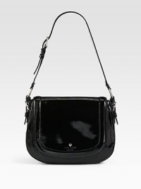 Glossy patent leather forms this lady-like silhouette, lined with a bold polka dots for a whimsical touch. Adjustable shoulder strap, 9½-11½ dropMagnetic snap closure on front flapOne inside zip pocketTwo inside open pocketsCotton lining11W X 8½H X 3½DImported Glossy patent leather forms this lady-like silhouette, lined with a bold polka dots for a whimsical touch. Adjustable shoulder strap, 9½-11½ dropMagnetic snap closure on front flapOne inside zip pocketTwo inside open pocketsCotton lining11W X 8½H X 3½DImported