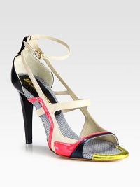 Edgy cutouts shape this strappy leather design with glossy patent trim, combining matte and metallic textures in vibrant shades. Lacquered heel, 4 (100mm)Leather upper with metallic leather and patent leather trimAdjustable ankle strapLeather lining and solePadded insoleMade in Italy Edgy cutouts shape this strappy leather design with glossy patent trim, combining matte and metallic textures in vibrant shades. Lacquered heel, 4 (100mm)Leather upper with metallic leather and patent leather trimAdjustable ankle strapLeather lining and solePadded insoleMade in Italy