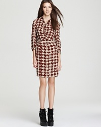 Uptown polish meets downtown edge as classic houndstooth check emboldens a contemporary Burberry Brit dress. Juxtapose the silky silhouette with chunky booties for the perfect high/low mix. Uptown polish meets downtown edge as classic houndstooth check emboldens a contemporary Burberry Brit dress. Juxtapose the silky silhouette with chunky booties for the perfect high/low mix.