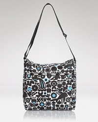 LeSportsac's signature crossbody is updated in a shiny patent nylon. This cooly functional bag features exterior pockets and an adjustable strap for effortless on-the-go style. LeSportsac's signature crossbody is updated in a shiny patent nylon. This cooly functional bag features exterior pockets and an adjustable strap for effortless on-the-go style.