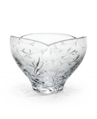 A delicate, etched vine motif and an asymmetrical rim infuses your décor with a gentle sophistication. A delicate, etched vine motif and an asymmetrical rim infuses your décor with a gentle sophistication.