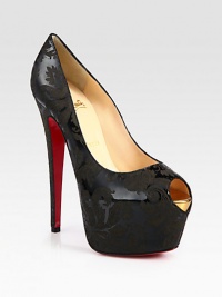 Peep toe silhouette of lustrous patent leather with an arabesque motif, resting on a towering heel and platform. Self-covered heel, 6¼ (155mm)Hidden platform, 2¼ (60mm)Compares to a 4 heel (100mm)Patent leather upper with an arabesque motifPeep toeLeather liningSignature red leather solePadded insoleMade in ItalyOUR FIT MODEL RECOMMENDS ordering one half size up as this style runs small. Peep toe silhouette of lustrous patent leather with an arabesque motif, resting on a towering heel and platform. Self-covered heel, 6¼ (155mm)Hidden platform, 2¼ (60mm)Compares to a 4 heel (100mm)Patent leather upper with an arabesque motifPeep toeLeather liningSignature red leather solePadded insoleMade in ItalyOUR FIT MODEL RECOMMENDS ordering one half size up as this style runs small.