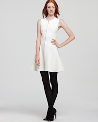 An exposed gold zipped front lends a modern edge to this stylish Theory dress, rendered in a light wool blend. An exposed gold zipped front lends a modern edge to this stylish Theory dress, rendered in a light wool blend.