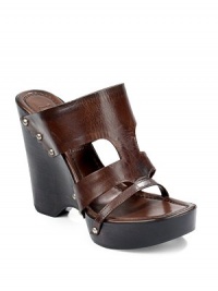 THE LOOKCutout leather upperDome stud accents at sidesWooden wedge, 4½ (115mm)Wooden platform, 1 (25mm)Compares to a 3½ heel (90mm)THE MATERIALLeather upperLeather lining and soleORIGINMade in Italy THE LOOKCutout leather upperDome stud accents at sidesWooden wedge, 4½ (115mm)Wooden platform, 1 (25mm)Compares to a 3½ heel (90mm)THE MATERIALLeather upperLeather lining and soleORIGINMade in Italy