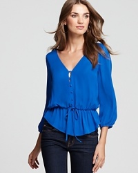Turn heads in one of the season's best brights with this Joie top. Pair this airy, feminine top with skinny jeans for a chic yet comfortable look. Turn heads in one of the season's best brights with this Joie top. Pair this airy, feminine top with skinny jeans for a chic yet comfortable look.