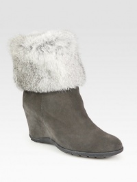 Luscious rabbit fur upgrades this casual suede boot with a versatile fold-over shaft. Hidden wedge, 3½ (90mm)Unfolded shaft, 9Leg circumference, 12Weatherproof suede upper with faux fur trimBack zipBreathable microfiber liningSlip resistant rubber solePadded insoleMade in Italy Luscious rabbit fur upgrades this casual suede boot with a versatile fold-over shaft. Hidden wedge, 3½ (90mm)Unfolded shaft, 9Leg circumference, 12Weatherproof suede upper with faux fur trimBack zipBreathable microfiber liningSlip resistant rubber solePadded insoleMade in Italy