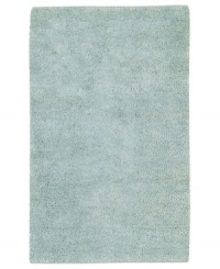 Bring a sensation of serenity to any room with a rich, felted wool rug in soothing spa blue. Hand-woven in India, this luxurious piece lets you in indulge in the supreme softness of plush New Zealand wool. Bring a sensation of serenity to any room with a rich, felted wool rug in soothing spa blue. Hand-woven in India, this luxurious piece lets you in indulge in the supreme softness of plush New Zealand wool.