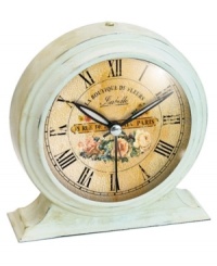 Featuring a distressed metal exterior, this elegant alarm clock lends your desk or bedside table an old-world style that's uniquely Parisian. Its traditional face has an antique quality, graced with a rosy bouquet and the French saying, Le Boutique de Fleurs. Featuring a distressed metal exterior, this elegant alarm clock lends your desk or bedside table an old-world style that's uniquely Parisian. Its traditional face has an antique quality, graced with a rosy bouquet and the French saying, Le Boutique de Fleurs.