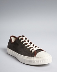 Classics stay true to themselves for a timeless, always in style look, as with Converse All-Stars in a low-top design and trimmed with leather for extra appeal. Classics stay true to themselves for a timeless, always in style look, as with Converse All-Stars in a low-top design and trimmed with leather for extra appeal.