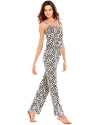 Whether you're wearing it as a coverup at the beach or out on the town with your highest heels, INC's jumpsuit will make heads turn! Whether you're wearing it as a coverup at the beach or out on the town with your highest heels, INC's jumpsuit will make heads turn!