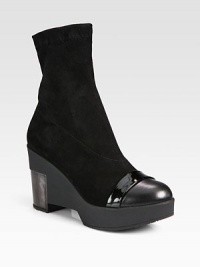 A suede essential with patent leather accents on the wedge and cap toe for a polished look.Rubber and patent leather wedge, 4¾ (120mm)Rubber platform, 2 (50mm)Compares to a 2¾ heel (70mm)Suede upper with a leather and patent leather cap toePull-on styleLeather liningRubber solePadded insoleImported A suede essential with patent leather accents on the wedge and cap toe for a polished look.Rubber and patent leather wedge, 4¾ (120mm)Rubber platform, 2 (50mm)Compares to a 2¾ heel (70mm)Suede upper with a leather and patent leather cap toePull-on styleLeather liningRubber solePadded insoleImported
