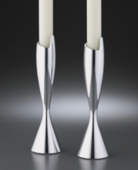 This dramatic candlestick pair adds contemporary flourish to the table. Crafted of Nambé metal alloy that has the heft and shine of solid silver but won't tarnish. Measures 7. This dramatic candlestick pair adds contemporary flourish to the table. Crafted of Nambé metal alloy that has the heft and shine of solid silver but won't tarnish. Measures 7.