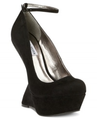Fashion-forward style. Steve Madden's Gammblee sculpted platform wedges feature a lovely ankle strap, making them one of the most uniquely feminine pairs you'll buy all season. Fashion-forward style. Steve Madden's Gammblee sculpted platform wedges feature a lovely ankle strap, making them one of the most uniquely feminine pairs you'll buy all season.