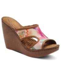Playful prints give the Sorina wedge sandals by Born just the spark you need to keep your day full of colorful fun. Playful prints give the Sorina wedge sandals by Born just the spark you need to keep your day full of colorful fun.