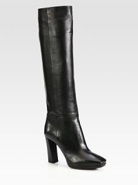 Tall leather silhouette with a square toe, stacked platform heel and side zip. Self-covered heel, 4 (100mm)Self-covered platform, ½ (15mm)Compares to a 3½ heel, (90mm)Shaft, 17Leg circumference, 14½Leather upperSide zipLeather liningRubber solePadded insoleMade in Italy Tall leather silhouette with a square toe, stacked platform heel and side zip. Self-covered heel, 4 (100mm)Self-covered platform, ½ (15mm)Compares to a 3½ heel, (90mm)Shaft, 17Leg circumference, 14½Leather upperSide zipLeather liningRubber solePadded insoleMade in Italy