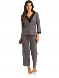 THE LOOKScalloped lace trimPants have drawstring tie at waistTHE FITTop: about 24 from shoulder to hemPants: rise, about 10; inseam, about 26THE MATERIALBody: polyester/rayonLace: rayon/spandexCARE & ORIGINMachine washImported THE LOOKScalloped lace trimPants have drawstring tie at waistTHE FITTop: about 24 from shoulder to hemPants: rise, about 10; inseam, about 26THE MATERIALBody: polyester/rayonLace: rayon/spandexCARE & ORIGINMachine washImported