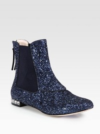 Glitter leather with side elastic gores, smooth trim and a jeweled heel. Glittered leather upper with leather trim and elastic goresBack zipLeather lining and solePadded insoleMade in Italy Glitter leather with side elastic gores, smooth trim and a jeweled heel. Glittered leather upper with leather trim and elastic goresBack zipLeather lining and solePadded insoleMade in Italy