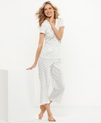 A pretty purple and blue floral print makes these pajamas by Charter Club a charming pair. The short-sleeve top matches perfectly with the full-length pants. A pretty purple and blue floral print makes these pajamas by Charter Club a charming pair. The short-sleeve top matches perfectly with the full-length pants.
