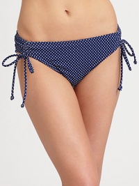 Polka dots add retro appeal to this adorable swim style with flattering ruched sides.Stretch comfortTies on ruched sidesFully lined92% polyester/8% spandexHand washMade in USA of Italian fabric Please note: Bikini top sold separately. 