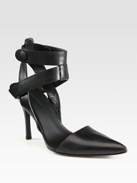 Skin-baring, elevated leather pump with criss-cross ankle straps and a daring point toe. Stacked heel, 4 (100mm)Leather upperAnkle straps with snap closuresPoint toeLeather lining and solePadded insoleImported Skin-baring, elevated leather pump with criss-cross ankle straps and a daring point toe. Stacked heel, 4 (100mm)Leather upperAnkle straps with snap closuresPoint toeLeather lining and solePadded insoleImported