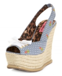 Fiercely tall. The brief lace-up vamp of the Ffab sandals by Betsey Johnson gives these towering wedges a feminine, sporty feel. Fiercely tall. The brief lace-up vamp of the Ffab sandals by Betsey Johnson gives these towering wedges a feminine, sporty feel.