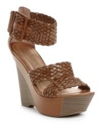 Tread lightly. With a sky-high wedge heel, sculpted platform and thick, woven straps, the Candiss sandals by BCBGeneration are a fashion risk you'll dare to wear. Tread lightly. With a sky-high wedge heel, sculpted platform and thick, woven straps, the Candiss sandals by BCBGeneration are a fashion risk you'll dare to wear.