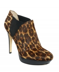 Sultry, yet sophisticated. The Madison platform booties feature an all-over leopard print and elastic gore on the sides for a snug and comfy fit. Sultry, yet sophisticated. The Madison platform booties feature an all-over leopard print and elastic gore on the sides for a snug and comfy fit.