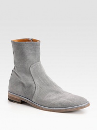 Constructed of bleached cotton canvas with side zipper.Topstitching detailsStacked heelShaft, 8½Leg circumference, 13Leather lining and solePadded insoleMade in Italy Constructed of bleached cotton canvas with side zipper.Topstitching detailsStacked heelShaft, 8½Leg circumference, 13Leather lining and solePadded insoleMade in Italy