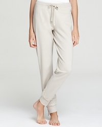 Rendered in velvety-soft cotton, these Burberry Brit lounge pants infuse your laidback style with luxe appeal. Tapered zip cuffs lend a chic finish to the sumptuous silhouette. Rendered in velvety-soft cotton, these Burberry Brit lounge pants infuse your laidback style with luxe appeal. Tapered zip cuffs lend a chic finish to the sumptuous silhouette.