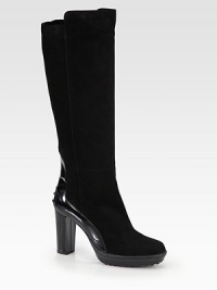 An elevated suede silhouette with lustrous patent leather detailing. Lacquered heel, 3¾ (95mm)Rubber platform, 1 (25mm)Compares to a 2¾ heel (70mm)Shaft, 14Leg circumference, 13Suede and patent leather upperPull-on styleLeather liningRubber solePadded insoleMade in Italy An elevated suede silhouette with lustrous patent leather detailing. Lacquered heel, 3¾ (95mm)Rubber platform, 1 (25mm)Compares to a 2¾ heel (70mm)Shaft, 14Leg circumference, 13Suede and patent leather upperPull-on styleLeather liningRubber solePadded insoleMade in Italy