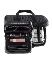 Trish's ultimate beauty organizer houses a patented Mini Makeup Planner-the one-and-only portable makeup vanity-two removable, see-through pouches for at-a-glance visibility of your essentials, and three lightweight bottles to be custom-filled with your beauty favorites. * Bottles in universally approved travel size * Sleek black nylon case in Trish's signature quilted pattern * Features a large zippered mesh pocket on the inside cover * Zippered, handled design makes for easy carrying * 9 x 2.5 x 13 inchesMakeup and Page shown in Planner not included. Trish's ultimate beauty organizer houses a patented Mini Makeup Planner-the one-and-only portable makeup vanity-two removable, see-through pouches for at-a-glance visibility of your essentials, and three lightweight bottles to be custom-filled with your beauty favorites. * Bottles in universally approved travel size * Sleek black nylon case in Trish's signature quilted pattern * Features a large zippered mesh pocket on the inside cover * Zippered, handled design makes for easy carrying * 9 x 2.5 x 13 inchesMakeup and Page shown in Planner not included.