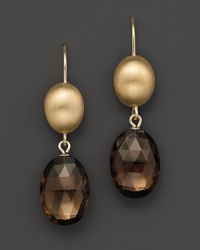 Faceted smoky quartz ovals, set in 14K yellow gold. Faceted smoky quartz ovals, set in 14K yellow gold.