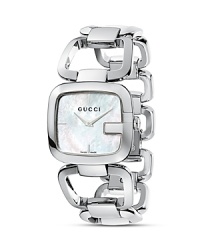First introduced in the late ‘60s, the famous Gucci G quickly became a worldwide sensation. It has been elegantly revisited in this stainless steel timepiece, which is also available with an edgy total black look. First introduced in the late ‘60s, the famous Gucci G quickly became a worldwide sensation. It has been elegantly revisited in this stainless steel timepiece, which is also available with an edgy total black look.