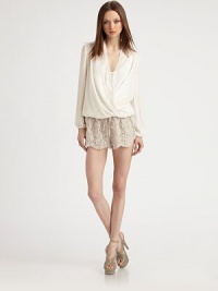Understated elegance in dreamy silk chiffon styled in a comely wrap-front silhouette.V necklineLong blouson sleevesBlouson bodiceAbout 22 from shoulder to hemSilkDry cleanImportedModel shown is 5'10 (177cm) wearing US size Small. Understated elegance in dreamy silk chiffon styled in a comely wrap-front silhouette.V necklineLong blouson sleevesBlouson bodiceAbout 22 from shoulder to hemSilkDry cleanImportedModel shown is 5'10 (177cm) wearing US size Small.