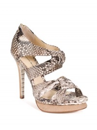 Luxurious python in a striking double knot design with cutouts, wooden island platform and back zipper.Stacked heel 5 (125mm) Wooden island platform, 1 (25mm) Compares to a 4 heel (100 mm) Open toe Back zipper Leather lining and sole Padded insole ImportedOUR FIT MODEL RECOMMENDS ordering one half-size up as this style runs small. Luxurious python in a striking double knot design with cutouts, wooden island platform and back zipper.Stacked heel 5 (125mm) Wooden island platform, 1 (25mm) Compares to a 4 heel (100 mm) Open toe Back zipper Leather lining and sole Padded insole ImportedOUR FIT MODEL RECOMMENDS ordering one half-size up as this style runs small.
