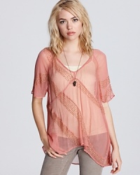 Layer a cami beneath this sheer, wispy-light Free People top for boho-chic defined. Layer a cami beneath this sheer, wispy-light Free People top for boho-chic defined.