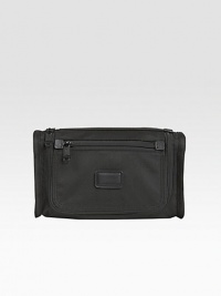 A classic travel kit made from signature ballistic nylon features include interior elastic loops, an outside zip pocket and webbing handle strap. Zip closure Nylon lining 10¾W X 6¼H X 3½ Imported A classic travel kit made from signature ballistic nylon features include interior elastic loops, an outside zip pocket and webbing handle strap. Zip closure Nylon lining 10¾W X 6¼H X 3½ Imported