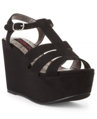 Powerful patterns and mega-height. Material Girl's Lane platform wedge sandals are a bold way to incorporate patterns into your look. Powerful patterns and mega-height. Material Girl's Lane platform wedge sandals are a bold way to incorporate patterns into your look.