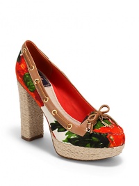 THE LOOKA collaboration with Milly and Sperry Top-SiderRose print canvas upperContrast leather trim at vamp and toplineLeather strap weaves through grommets at toplineLeather bow with metal M charmPadded insoleJute heel, 4½(115mm)Jute platform, 1(25mm)Compares to a 3½ heel(90mm)THE MATERIALCanvas upperLeather and jute trimRubber soleORIGINImported