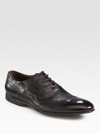 Dip-dyed leather with a lustrous finish is the epitome of high-powered style and sophistication.Leather upperLeather liningRubber soleMade in Italy Dip-dyed leather with a lustrous finish is the epitome of high-powered style and sophistication.Leather upperLeather liningRubber soleMade in Italy