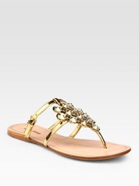 Metallic leather design with adjustable straps and jewel detail. Metallic leather and jewel upperLeather lining and soleMade in Italy Metallic leather design with adjustable straps and jewel detail. Metallic leather and jewel upperLeather lining and soleMade in Italy