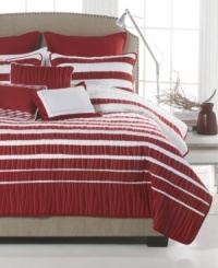 An island oasis awaits with this Nantucket quilt set from Bryan Keith. A rich red and white palette is embellished with horizontal stripes and vertical quilted details in a wavy line pattern for added depth. An island oasis awaits with this Nantucket quilt set from Bryan Keith. A rich red and white palette is embellished with horizontal stripes and vertical quilted details in a wavy line pattern for added depth.