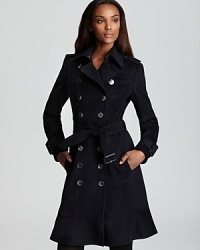 Rendered in a luxe blend of wool and cashmere, this Burberry London trench-style coat flaunts a ruffled hemline for ladylike flair. Rendered in a luxe blend of wool and cashmere, this Burberry London trench-style coat flaunts a ruffled hemline for ladylike flair.