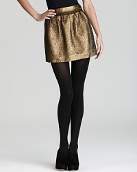 A new spin on solid gold, this little mini with big style brings metallic shine to the center spotlight with this DIANE von FURSTENBERG skirt. A new spin on solid gold, this little mini with big style brings metallic shine to the center spotlight with this DIANE von FURSTENBERG skirt.