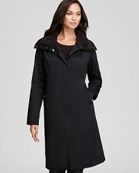 Cold-weather chic meets unsurpassed comfort as a plush faux-fur collar tops off a fleece-lined Eileen Fisher coat. Cold-weather chic meets unsurpassed comfort as a plush faux-fur collar tops off a fleece-lined Eileen Fisher coat.